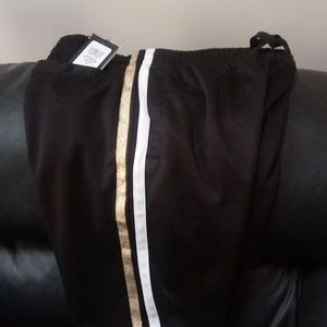 New. Unisex. CSG Black/gold rally pants.